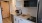 a kitchen with white cabinets