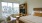 a bedroom with a bed and a tv
