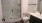 a bathroom with a tub, sink and toilet