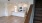 an empty kitchen and living room