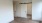 an empty room with a barn door