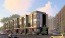 a building with cars parked in front